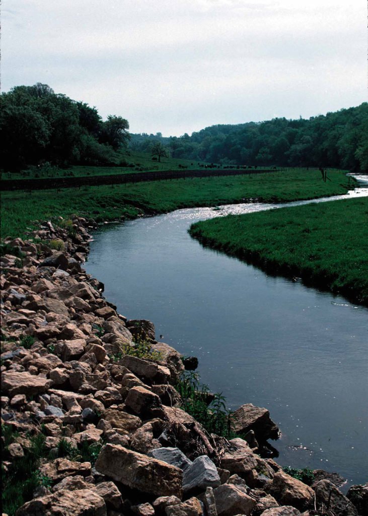 Rip rap along a riverbank